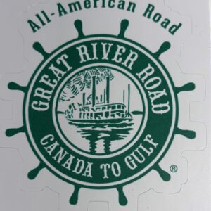 Golden retriever dog walking on autumn leaves path