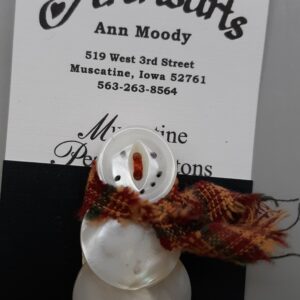 Modern white kitchen with marble island and pendant lights