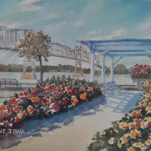 Person wearing colorful striped sweater against blue background