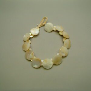 Golden retriever dog lying on wooden deck outdoors