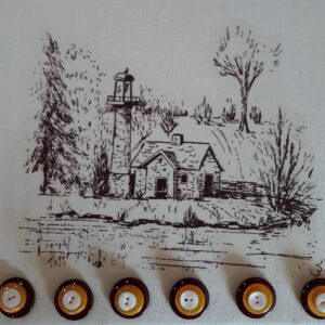 Happy golden retriever dog sitting on green grass outdoors