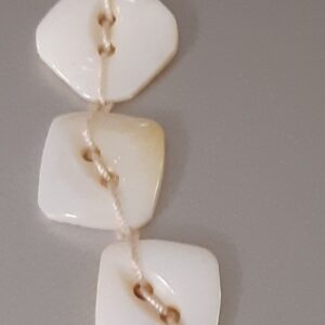 Person working on laptop in cozy coffee shop