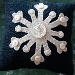 Golden retriever dog sitting in grassy field outdoors