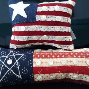 White wedding dress hanging on wooden door