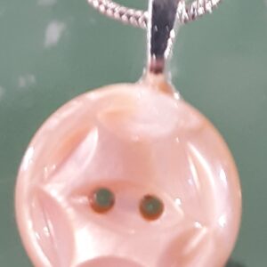 Modern geometric building with triangular glass facades and reflections