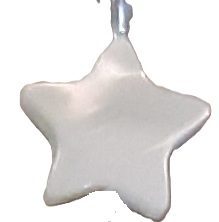 Young woman with curly hair smiling outdoors