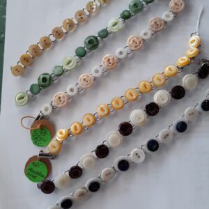 Wooden cutting board with fresh vegetables and herbs