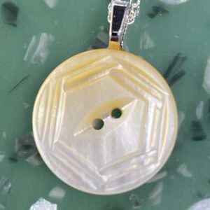 Woman in red dress standing in golden wheat field